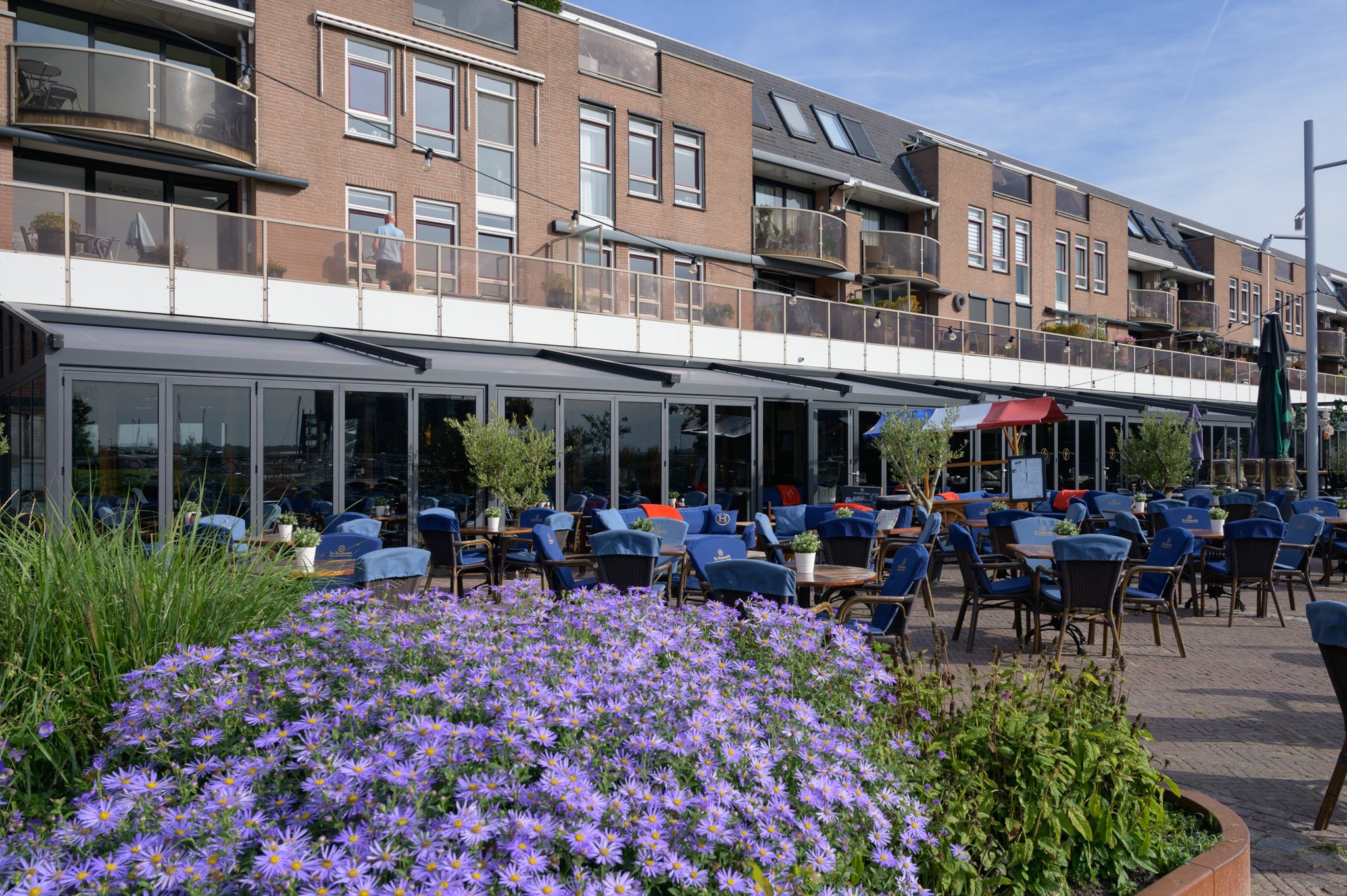 Terrasoverkapping met vouwdak en glazen vouwwanden CORNELS grootste overkapping